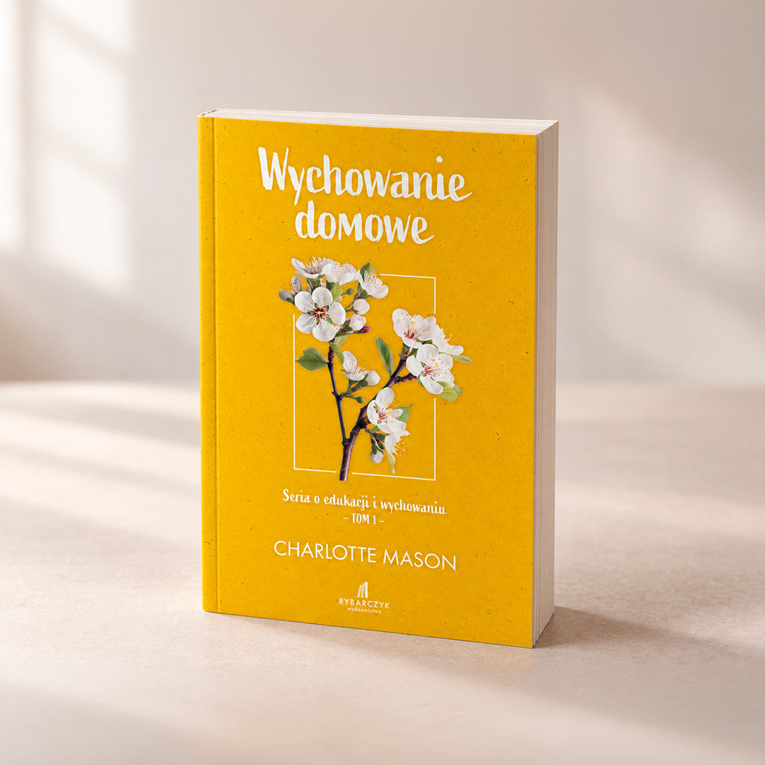 Żółta okładka książki Wychowanie domowe Charlotte Mason z ilustracją kwitnącej gałązki